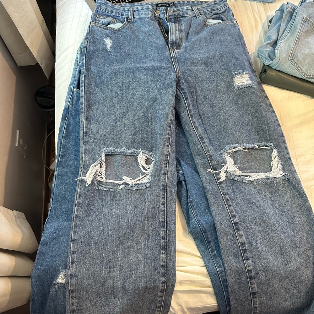 Wide legged ripped jeans
